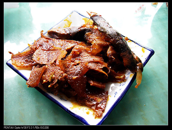 ���пڸе�ţͷ��