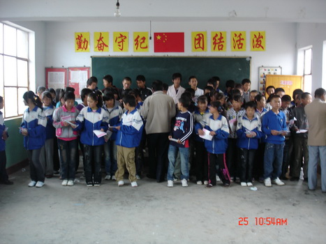 ѧУ��ʦ��æ���ľ�